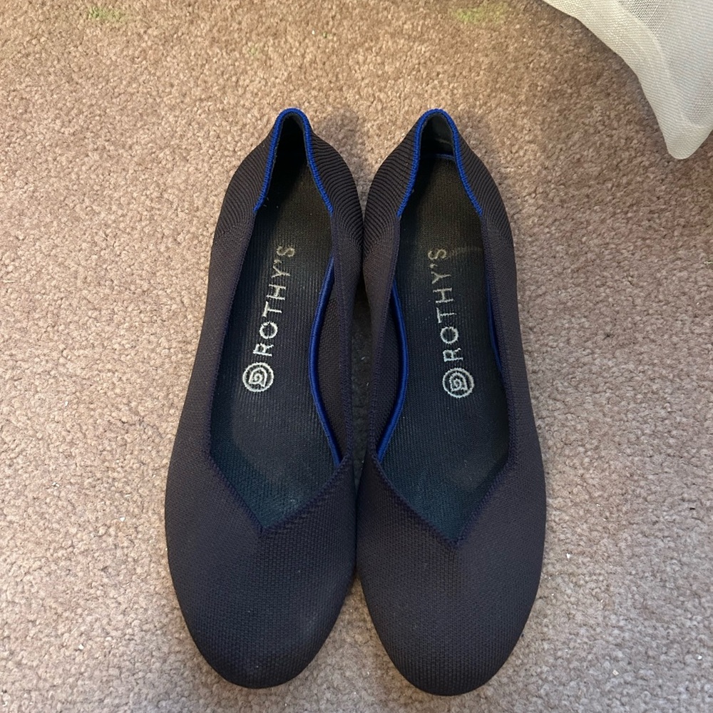 Rothy’s gray and purple flat